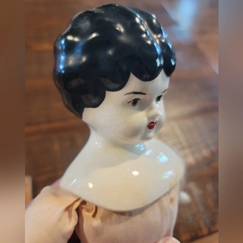 Beautiful Vintage China Head Doll rare brown eyes & pale face 15in‎